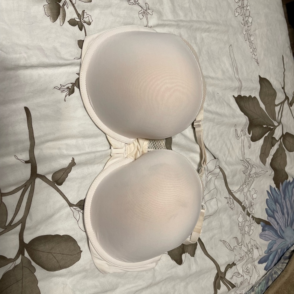 Cream colored Victoria’s Secret sports bra